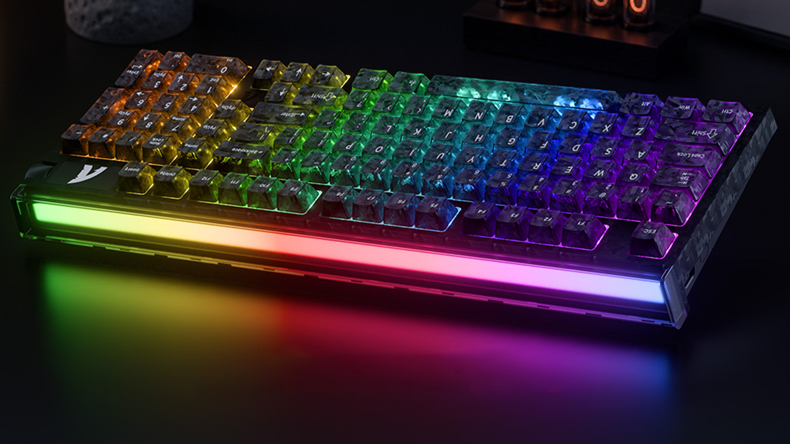 RGB mechanical gaming keyboard with transparent keycaps and colorful underglow lighting