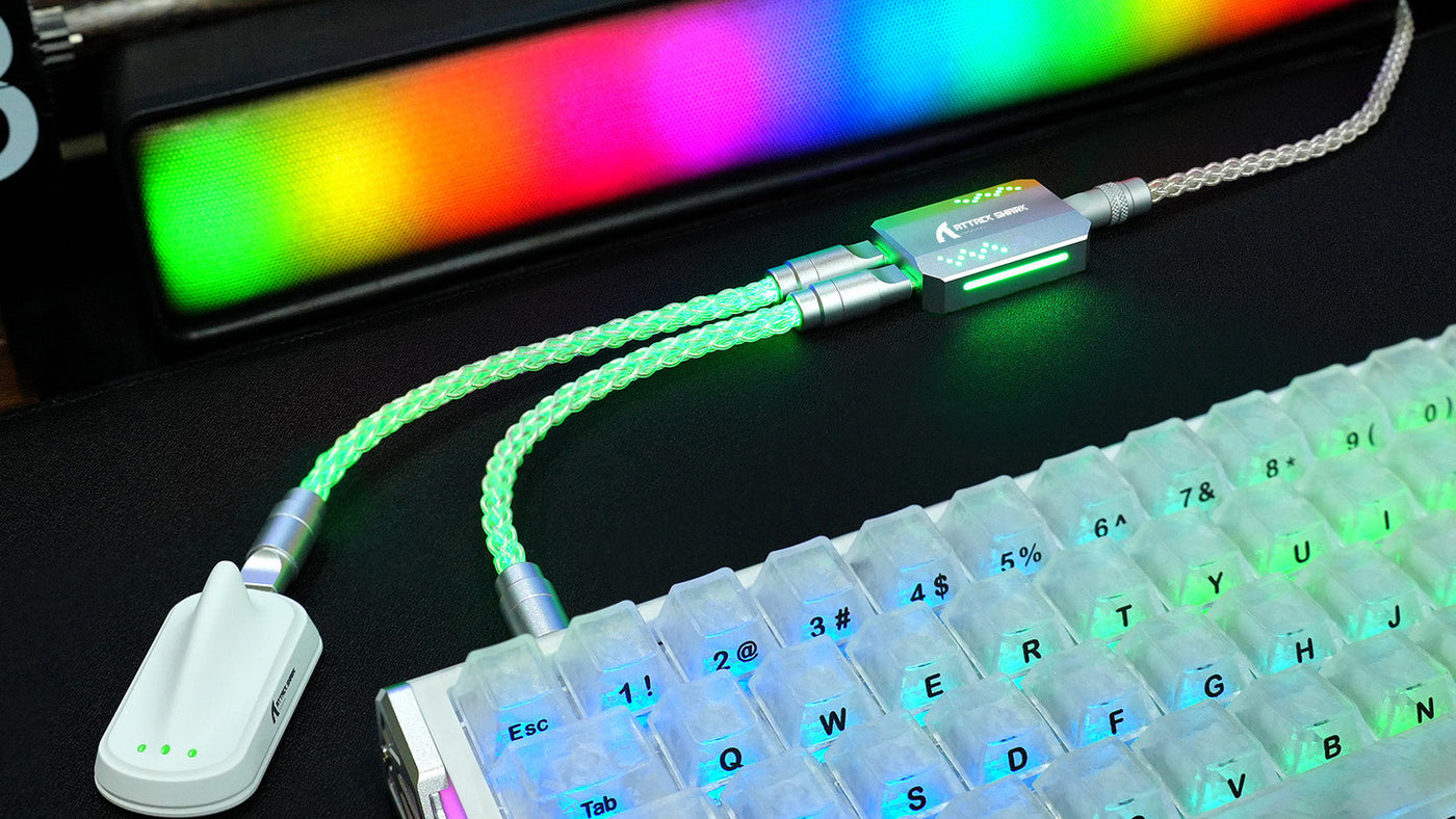 ATTACK SHARK magnetic USB-C cable with green RGB lighting connected to a translucent mechanical keyboard